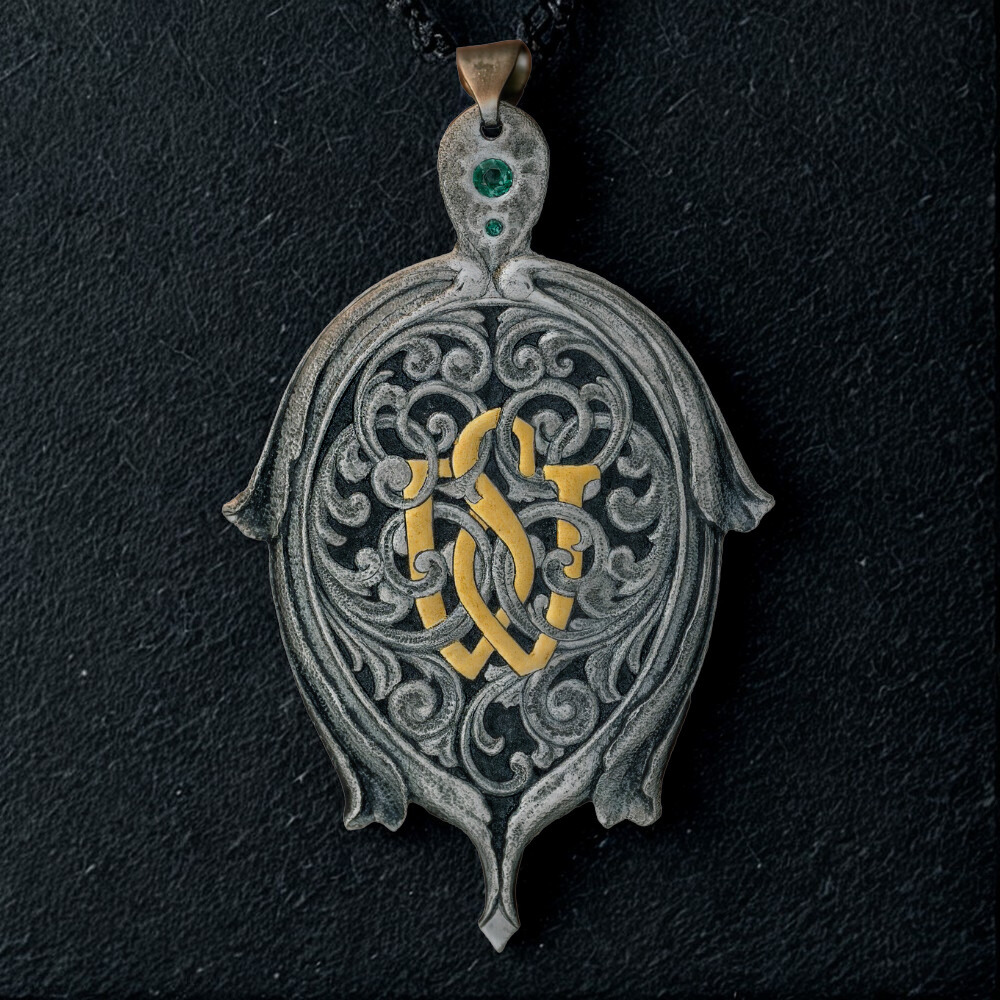 Decorative pendant with intricate designs on a dark textured background