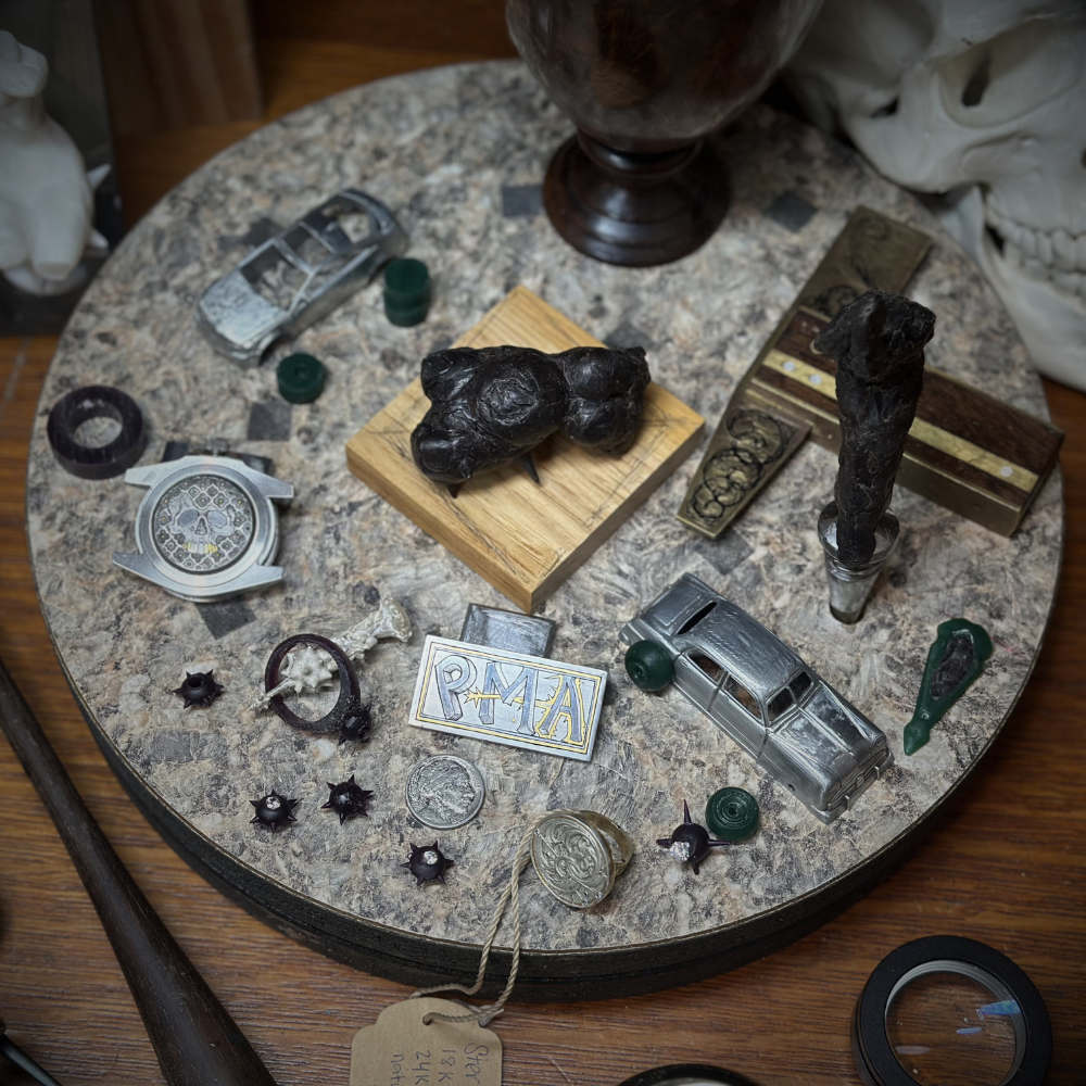 Collection of small objects on a round stone surface